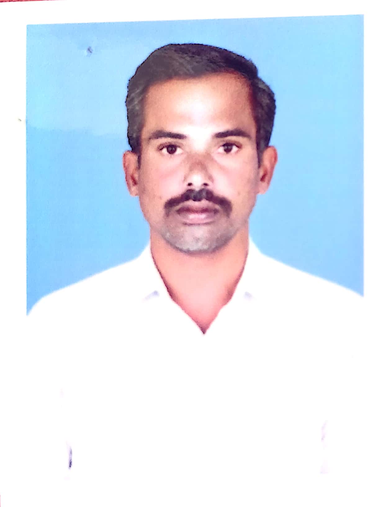 Dr. M. Karnan